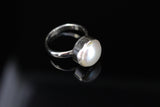 Real pearl ring, Set in sterling silver, This freshwater pearl is White or cream color. This ring can be an engagement to cocktail ring