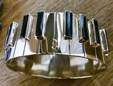 Piano Bangle Sterling silver with 14kt gold music symbol accents