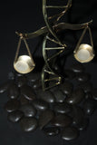 Justice Mobile Art, Metal art by Chester Allen called Due Process, consisting of DNA strand, and Scales of Justice, Art about Fairness
