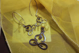 Yoga earrings, lotus position, silver infinity jewelry, energy work gift, Buddhist meditation Padmasana Yogi,  boho mind body spirit Hindi