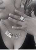 Piano earrings necklace ring and Bangle Jewelry set Sterling silver with 14kt gold music symbol accents. Moi Magazine