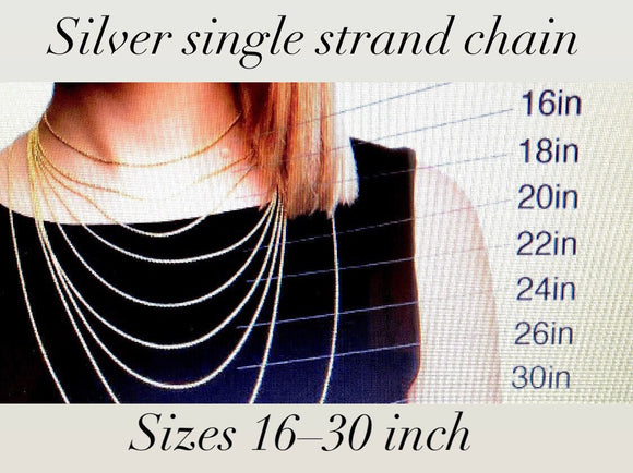 Silver chain, An accessory to add to a pendant to make a necklace. Sturdy, doesn’t tend to kink.