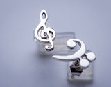 Music stud earrings, Treble and Bass Clef dainty earrings in opposite ears sterling silver handmade Chester Allen's unique music jewelry art