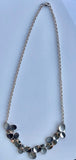 Silver necklace bib style nature inspired leaf design sterling matte hammered and high polish Finishes Moi Magazine, succulent necklace
