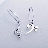 Music drop earrings, Treble and  Bass Clef in opposite ears, handmade Chester Allen's unique music jewelry art