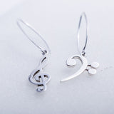 Music drop earrings, Treble and  Bass Clef in opposite ears, handmade Chester Allen's unique music jewelry art