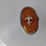 Fleur de lis Amber ring Handmade by New Orleans artist Chester Allen one of a kind in Butterscotch amber stone set in Sterling silver