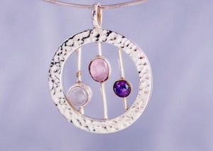 Unique handmade pendant, multi gemstone artistically crafted in hammered sterling silver