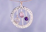 Unique handmade pendant, multi gemstone artistically crafted in hammered sterling silver