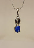 Blue lapis lazuli necklace, handmade gift in sterling silver Cowrie shell, casted with oval stone for leadership, December birthstone