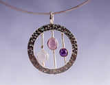 Unique handmade pendant, multi gemstone artistically crafted in hammered sterling silver
