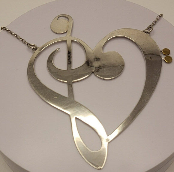 Music Heart Necklace Sterling silver with carnelian stone by New Orleans artist Chester Allen relationship jewelry art