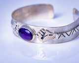 Clinched fist cuff, silver bracelet with amethyst stone representing Unity, struggle, empowerment, unique handmade jewelry