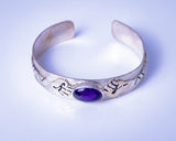Clinched fist cuff, silver bracelet with amethyst stone representing Unity, struggle, empowerment, unique handmade jewelry