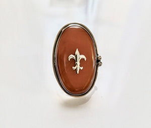 Fleur de lis Amber ring Handmade by New Orleans artist Chester Allen one of a kind in Butterscotch amber stone set in Sterling silver