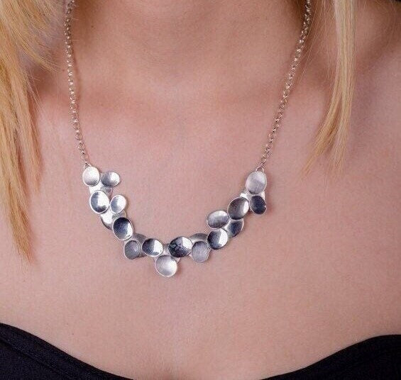 Silver necklace bib style nature inspired leaf design sterling matte hammered and high polish Finishes Moi Magazine, succulent necklace
