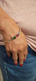 Handmade Sterling Silver Bangle: Ruby and Green Topaz Bracelet