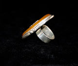 Fleur de lis Amber ring Handmade by New Orleans artist Chester Allen one of a kind in Butterscotch amber stone set in Sterling silver