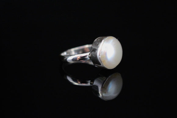 Real pearl ring, Set in sterling silver, This freshwater pearl is White or cream color. This ring can be an engagement to cocktail ring