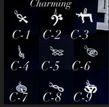Music symbol charm, Bass clef, Forming Eye of Hurricane, Small charm,  Holdin it Down, dainty music jewelry, Jazz bass gift